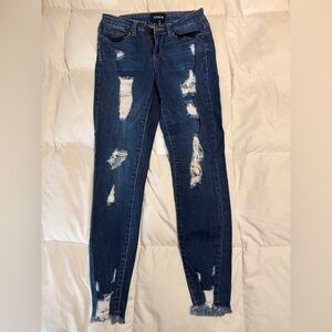 Distressed Blue Jeans